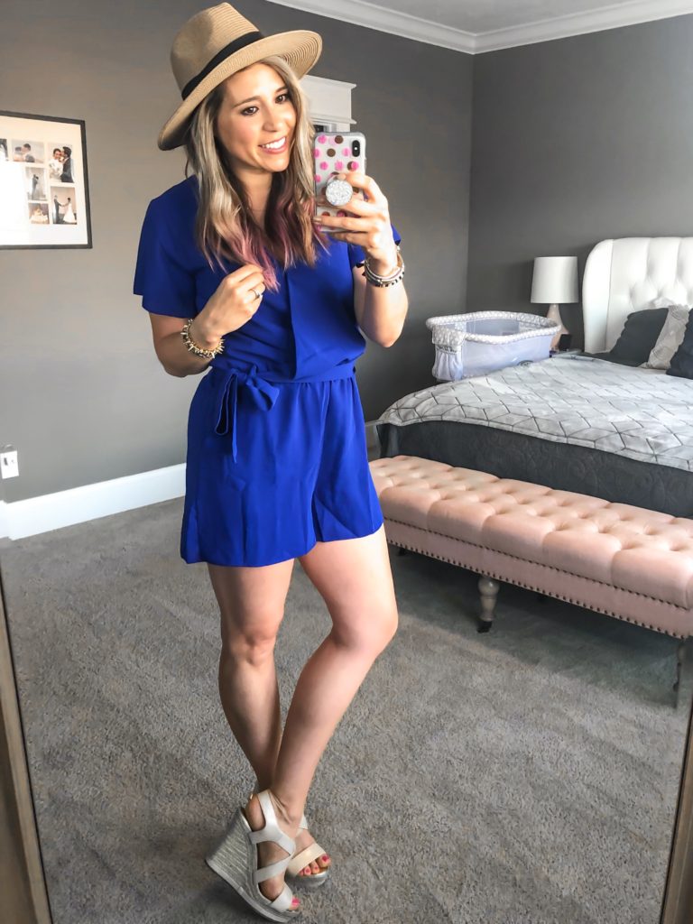 Cute travel outfit- bright blue romper with panama hat and nude wedges