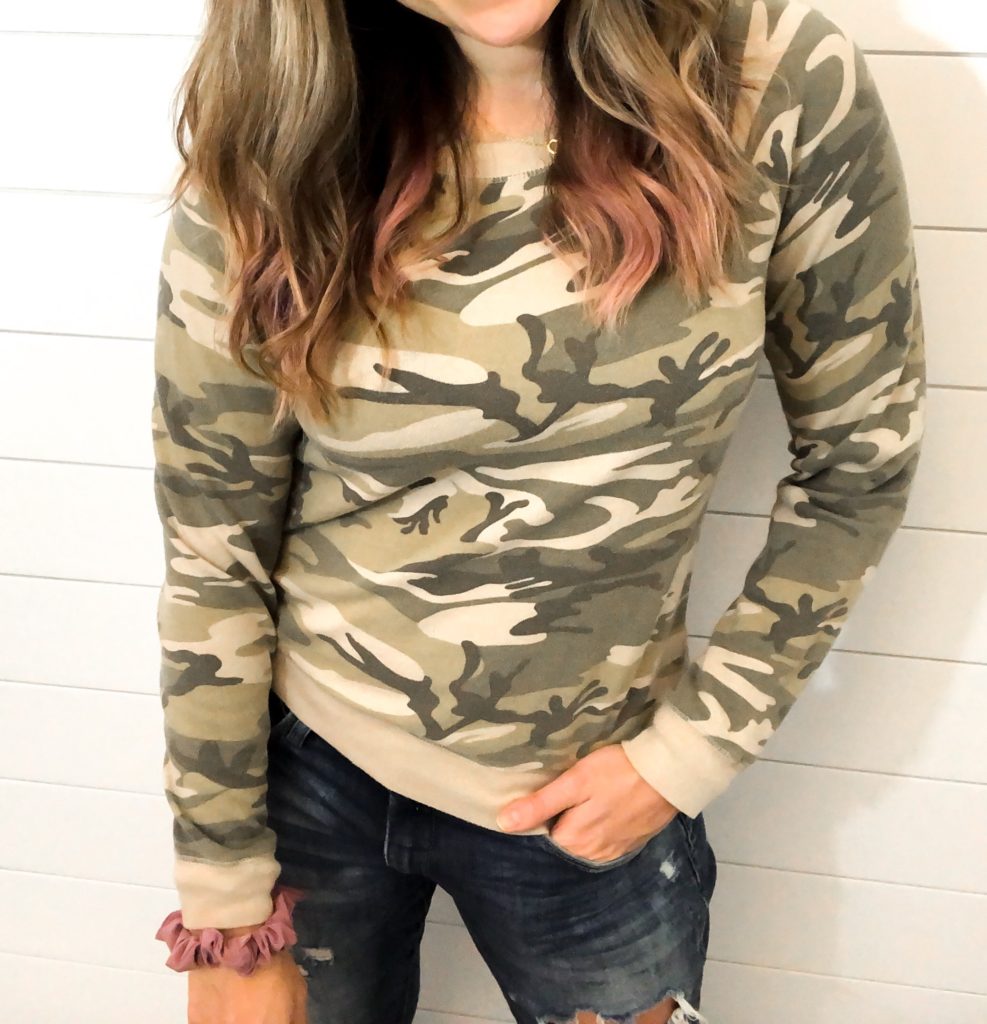 cute casual fall outfit- comfy cozy camo pullover sweatshirt and distressed jeans